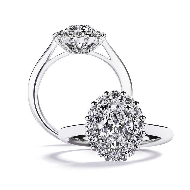 Rosetring med oval diamant og krans af brillanter