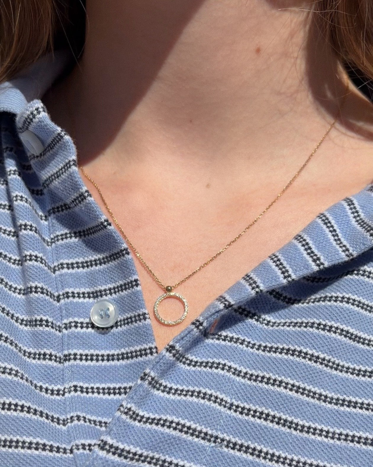 Cirkelvedhæng i 18 kt. hvidguld med 0,16 ct. brillanter