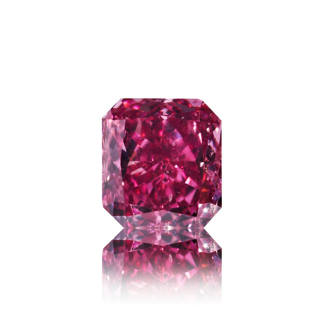 0,12 carat radiant cut Natural Fancy Vivid Purplish Pink diamant.   GIA certifikat medfølger. 