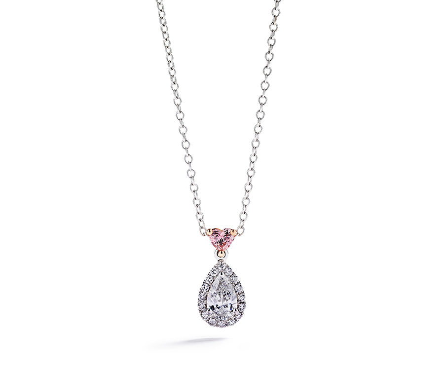Diamant vedhæng med 0,81 ct. dråbesleben diamant og Argyle Pink hjertediamant