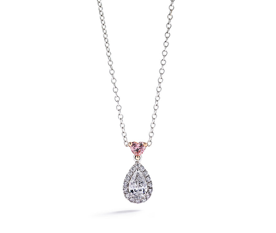 Diamant vedhæng med 0,81 ct. dråbesleben diamant og Argyle Pink hjertediamant