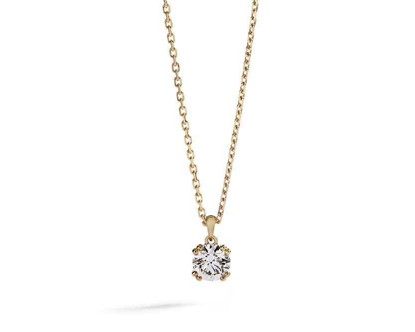 Copenhagen Solitaire brillantvedhæng i 18 kt. gulguld prydet med en 0,72 ct. Top Wesselton(G)/VS2 brillant. Pris er inkl. kæde (42-45 cm). 